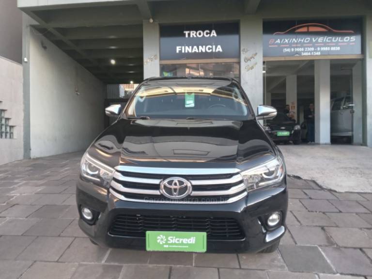 TOYOTA - HILUX - 2016/2016 - Preta - Sob Consulta
