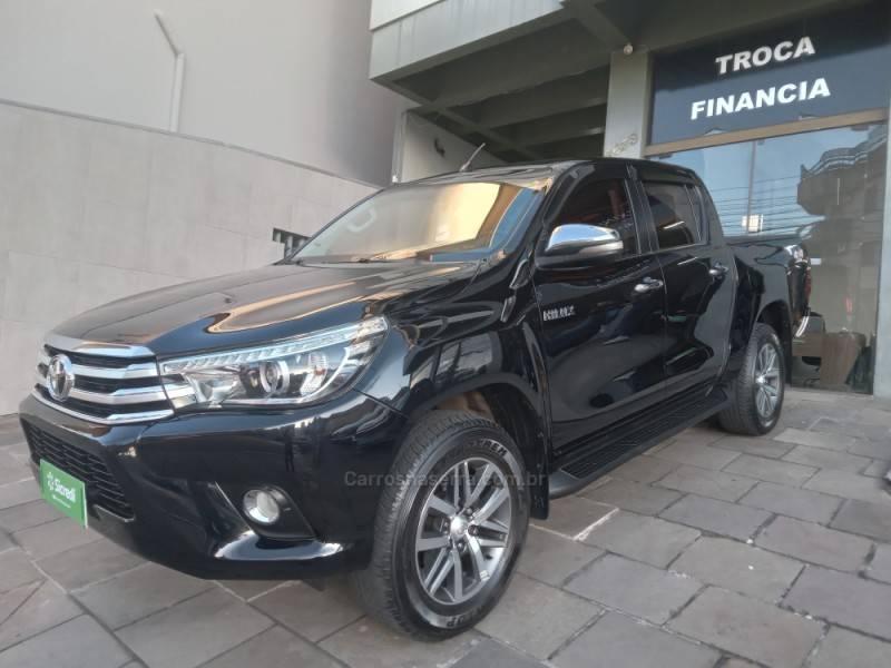 TOYOTA - HILUX - 2016/2016 - Preta - Sob Consulta