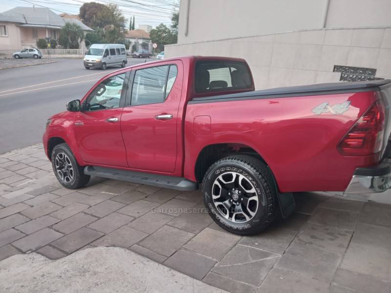 TOYOTA - HILUX - 2021/2021 - Vermelha - Sob Consulta